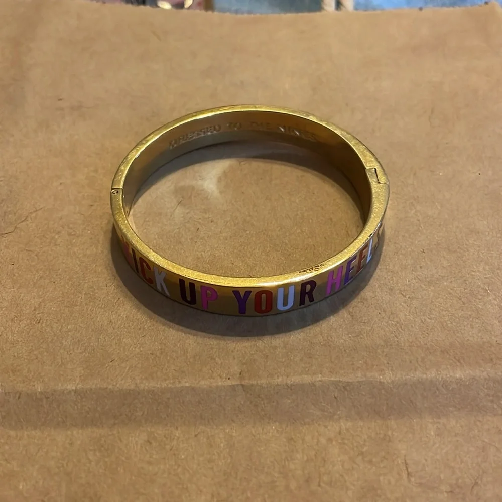 Gold-plated Kate Spade bangle